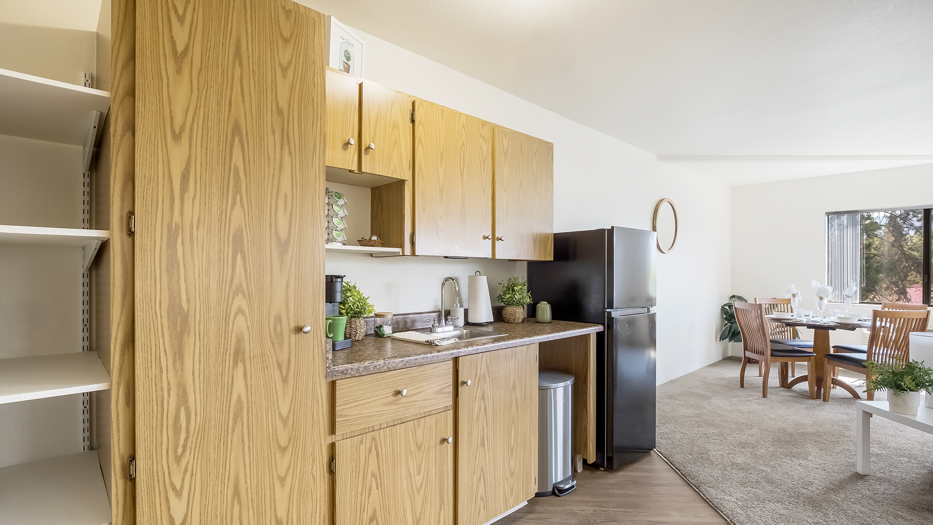 Kitchenette, refrigerator and dining area