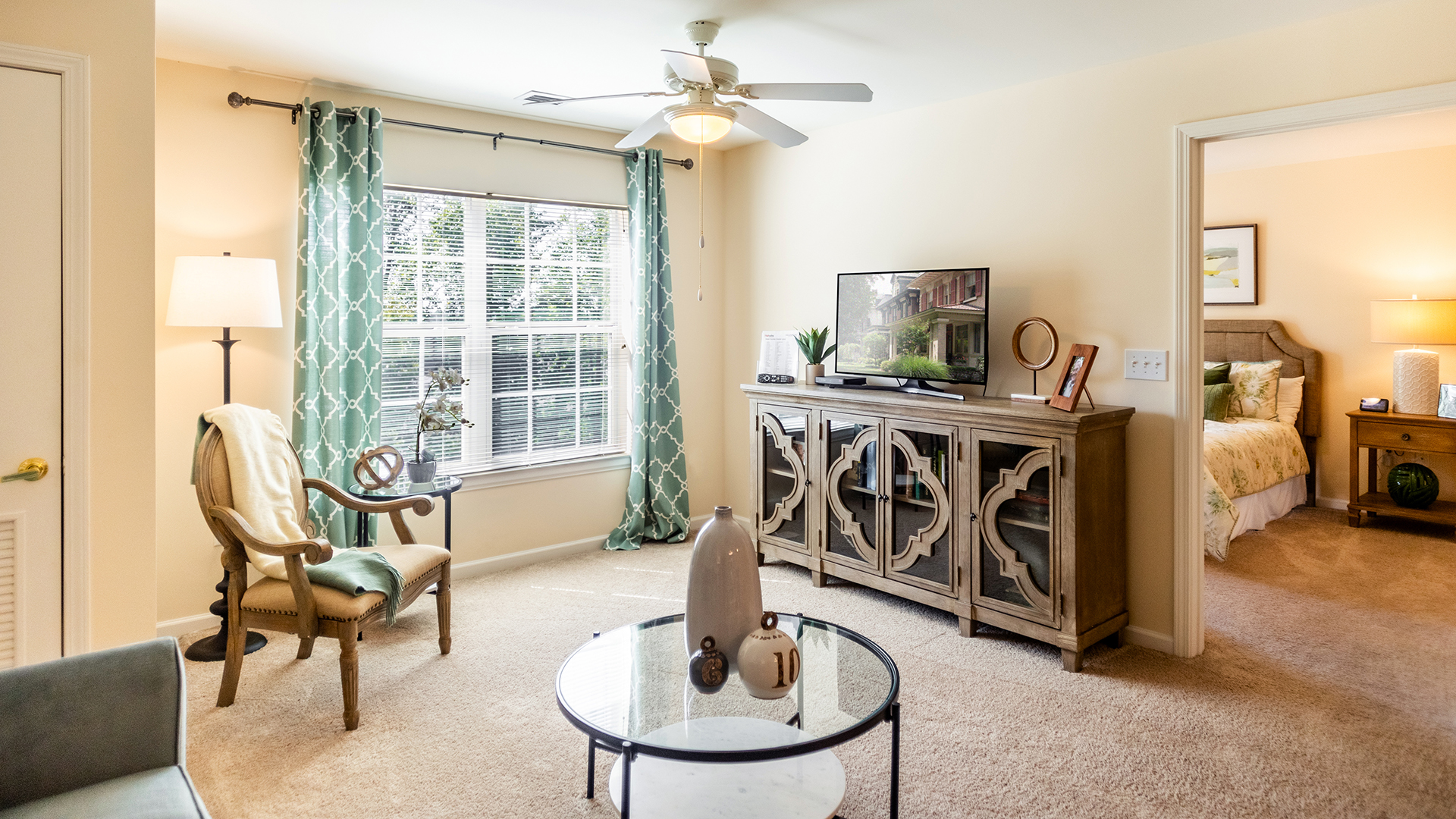 One-bedroom apartment showing living room and bedroom