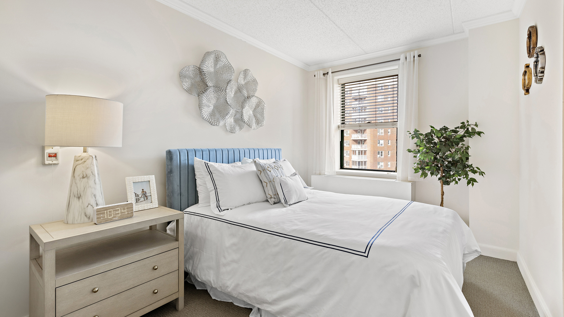 atria riverdale senior apartment bedroom with queen bed